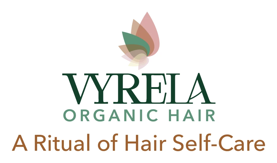 VYRELA Organic Hair logo: a halo of pink, brown, green and cream petals above the name in emerald green, with the tagline A Ritual of Hair Self-Care.